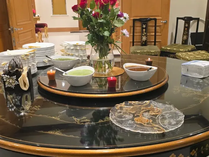 Table set for an intimate home dinner with chutneys and starters