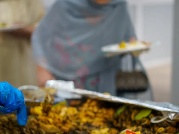 Chicken tikka cooking on the grill